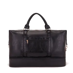 Bolsa de viaje grande de cuero PU negro con compartimento inferior y cremalleras doradas.