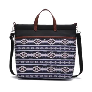 Detailed front view of a vintage Bohemian Aztec print waterproof laptop tote bag for women.