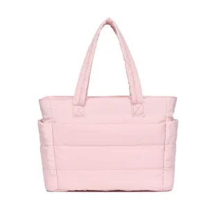 Lightweight pink quilted travel tote bag design with large capacity and side pockets.