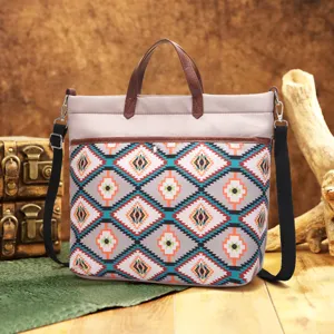 Detailed view of the Bohemian Aztec pattern laptop bag placed in a rustic studio setting