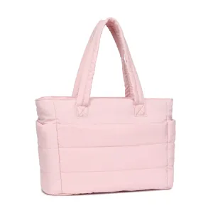 Detailed view of lightweight pink quilted travel bag with large capacity for gym or sport