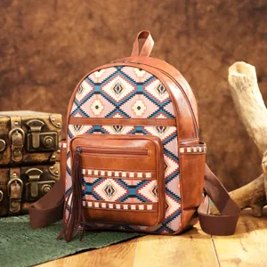 Casual bohemian Aztec pattern backpack presented on a rustic vintage wooden background
