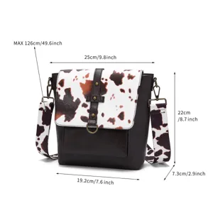 Detailed dimensions of a vintage cow print crossbody bag for women with adjustable strap