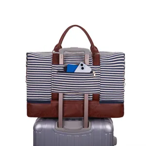 Gran bolsa de viaje a rayas con funda para trolley y ribetes de cuero marrón