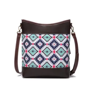 Front view of a Bohemian Aztec print crossbody bag with brown leather trim and waterproof fabric