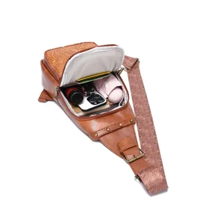 Detail view showing the spacious internal capacity of this vintage floral Western sling bag