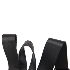 Close-up detail of black woven and leather backpack shoulder straps on white background
