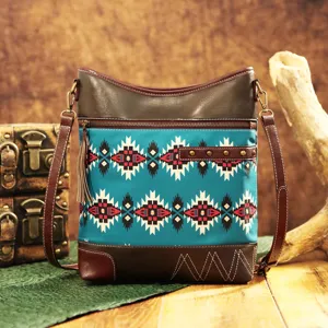 Vintage Bohemian Aztec print waterproof crossbody bag with leather trim and tassel.