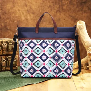 Detailed view of Bohemian Aztec pattern waterproof tote bag with brown leather handles