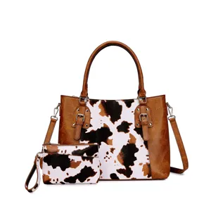 Conjunto de 2 piezas de bolso y cartera vintage con estampado de vaca y cuero marrón