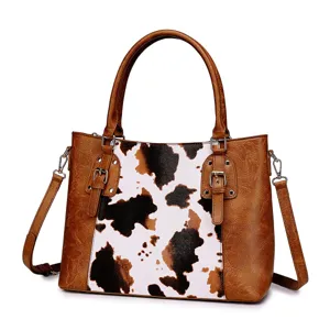 Bolso tote estilo Western retro con cuero marrón y detalles únicos de estampado de vaca.