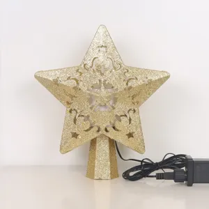 Goldener glitzernder LED-Weihnachtsbaumstern mit einem integrierten Projektorlicht