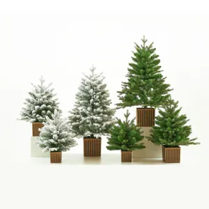 Varietà di alberi di Natale vintage in vaso disponibili in stili verde e innevato