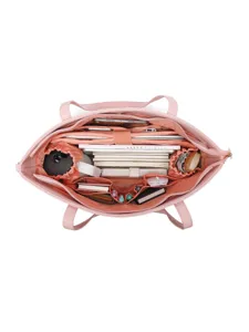 Vista superior del bolso rosa para portátil con compartimentos internos muy organizados
