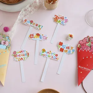 Macro view of colorful Teacher's Day bouquet cards with heartfelt greeting messages