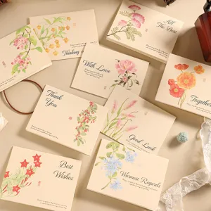 Detailed view of vintage kraft greeting cards featuring various floral illustrations