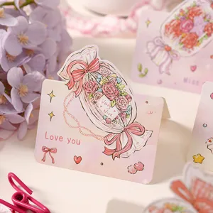 Detailed close-up of a pink cartoon candy flower bouquet greeting card with romantic bows