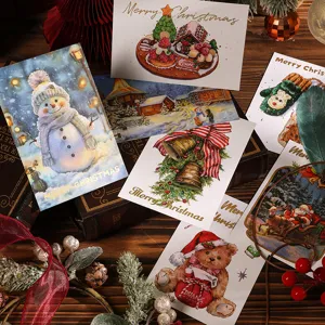 Colección de postales navideñas con detalles dorados e ilustraciones clásicas vintage