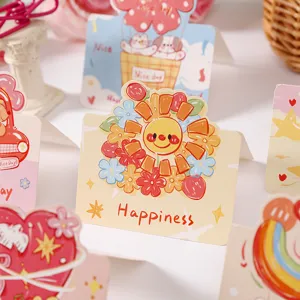 Close-up of cute cartoon sunflower greeting card with Happiness text