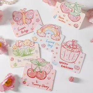 Vue détaillée de cartes de vœux dessinées à la main avec illustrations de fruits et fleurs
