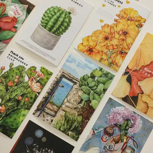 Varias tarjetas de felicitación artísticas con ilustraciones de flores y cactus para regalos