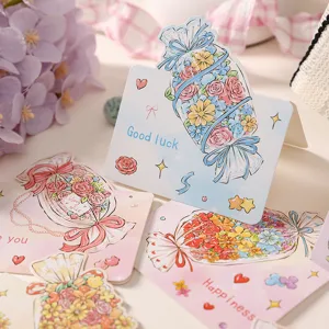Close-up of creative cartoon candy bouquet greeting cards with Good Luck message