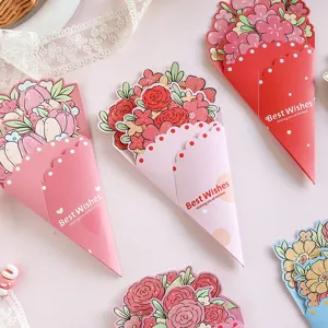 Detailed view of assorted bouquet-shaped greeting cards with floral illustrations and Best Wishes.