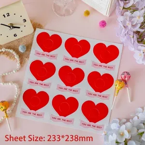 Close-up detail of heart-shaped lollipop greeting cards with inspirational text and size info