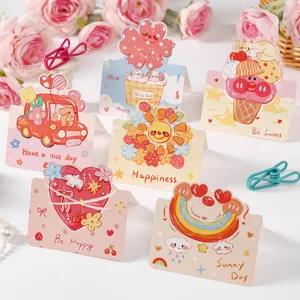 Close-up of colorful cartoon graffiti greeting cards with cute English blessings