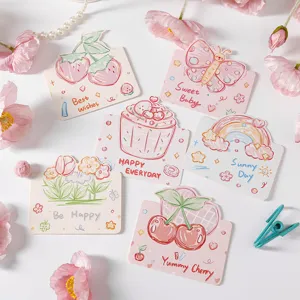 Gros plan de six jolies cartes de vœux dessinées à la main avec divers motifs illustrés