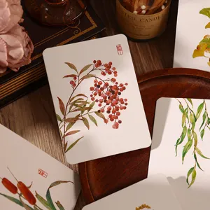 Detalle de ilustración botánica vintage con bayas rojas en cartulina blanca