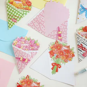 Détail de cartes de vœux bouquet de fleurs avec formes découpées et motifs.