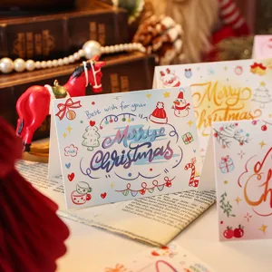 Hand-drawn style Christmas card featuring Merry Christmas text and festive motifs.