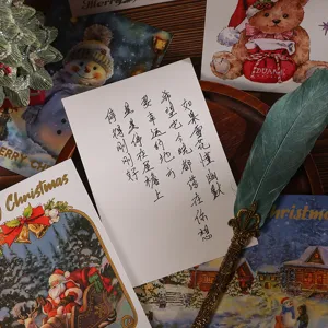 Juego de tarjetas de Navidad con diseños de Papá Noel y muñeco de nieve con pluma