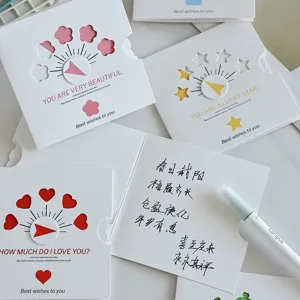 Interior view of rotating hollow greeting cards featuring elegant handwritten calligraphy