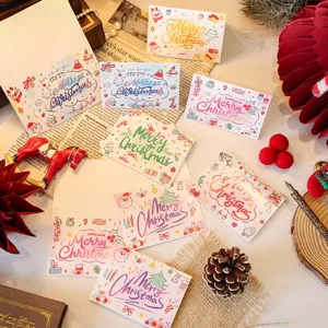 Detailed view of assorted mini Christmas greeting cards featuring festive illustrations