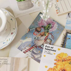 Detalle de tarjetas de felicitación florales con hermosas ilustraciones y citas motivadoras