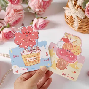Detail showing two cartoon graffiti greeting cards with hot air balloon and ice cream designs