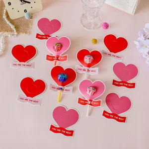 Cute heart-shaped lollipop cardstock holders with motivational text for school students.