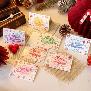 Detailed view of colorful Merry Christmas greeting cards with cute festive illustrations.