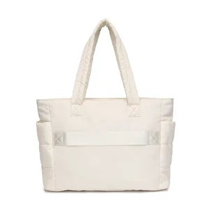 Large capacity elegant off-white quilted travel bag with convenient luggage strap