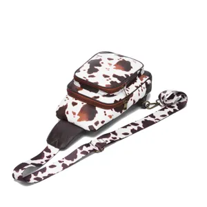 Detailed side view of bohemian western style sling bag featuring retro cow print pattern