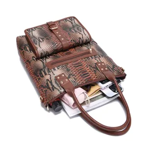 Vintage faux snake print tote bag set with matching pouch showing interior capacity