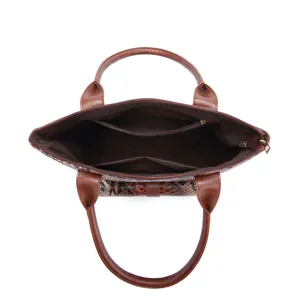 Detailed interior view of a vintage brown snake skin tote bag with organizer pockets