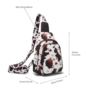 Cow print crossbody sling bag for women with size dimensions 28.5x20x6.5 cm shown in detail