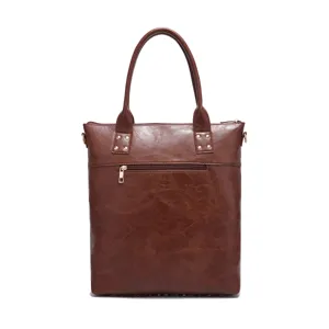 Vintage brown faux leather tote bag with front zipper pocket and metal rivets detail