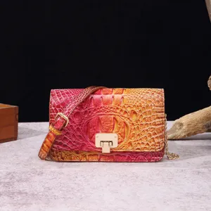 Elegante bolso bandolera vintage para mujer con estampado de cocodrilo degradado rosa y naranja