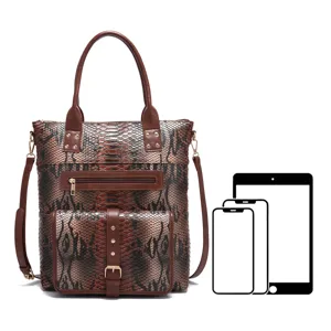 Capacity view of the snakeskin pattern tote bag showing its size relative to electronic devices