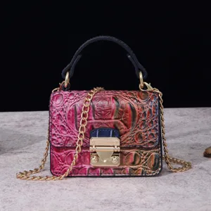 Bolso bandolera vintage multicolor con textura de cocodrilo y cierre dorado