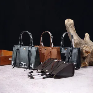 Group view of vintage Western mini tote bags in various colors with animal print accents.